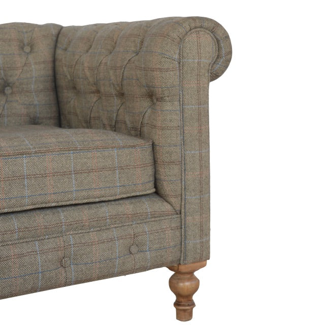 detail of tweed Chesterfield sofa