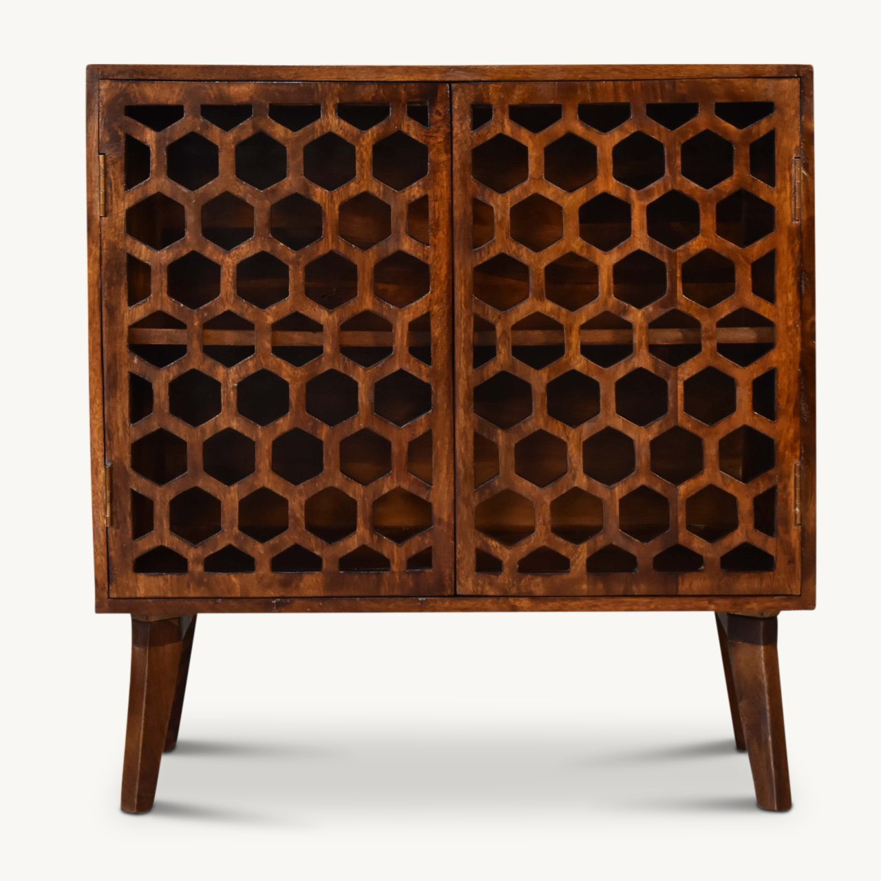 Solid wood cabinet with carved honeycomb patterned doors