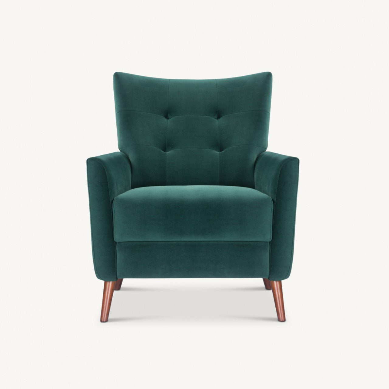 modern button backed armchair upholstered in emerald green velvet