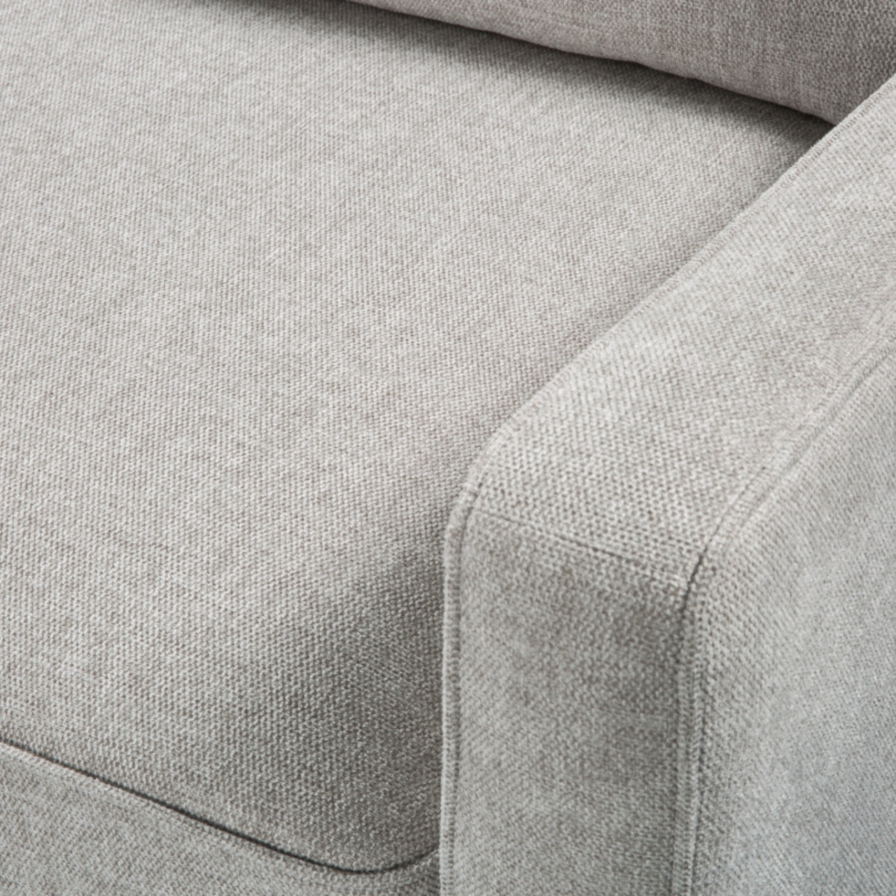 detail of simple, modern 2.5 seater sofa upholstered  in stone linen