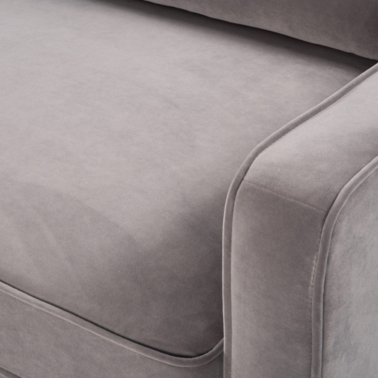 detail of detail of simple, modern 2.5 seater sofa upholstered  in stone grey velvet