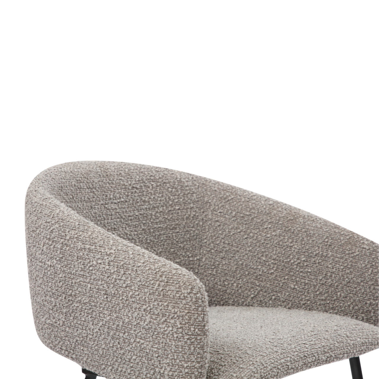detail of upholstered curved dining chair in boucle fabric